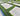 Geometric pattern of grass and concrete in a garden setting